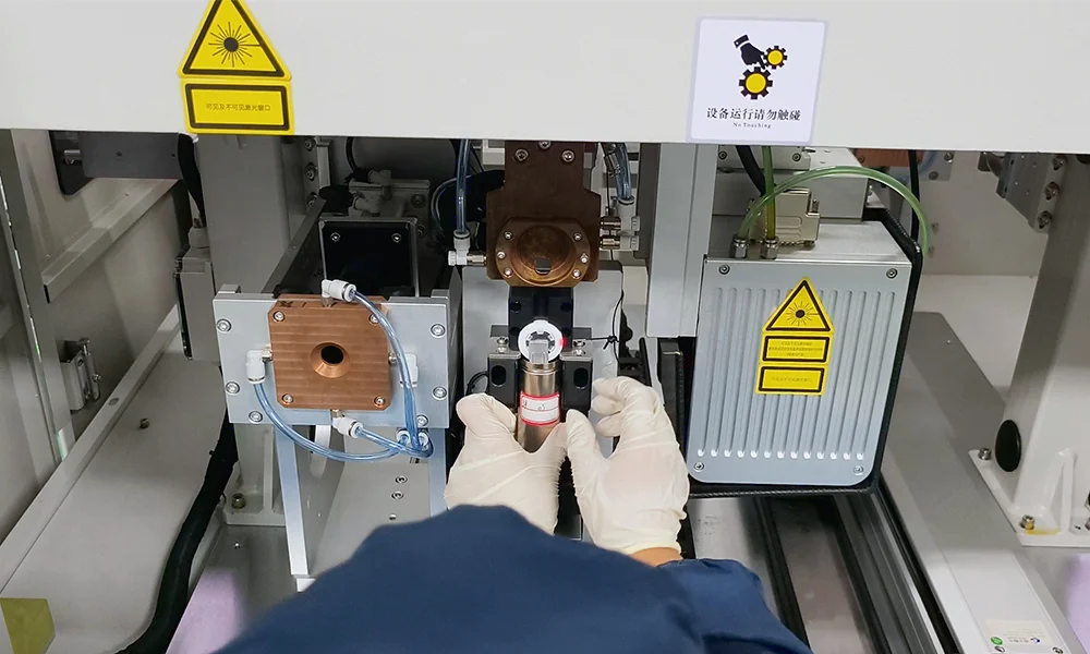 32140 Tabless Cylindrical Cell Positive Cap Welding Positive cap welding for a 32140 tabless cylindrical cell